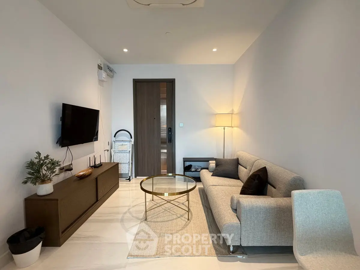 Modern living room with sleek furniture and stylish decor, perfect for contemporary urban living.