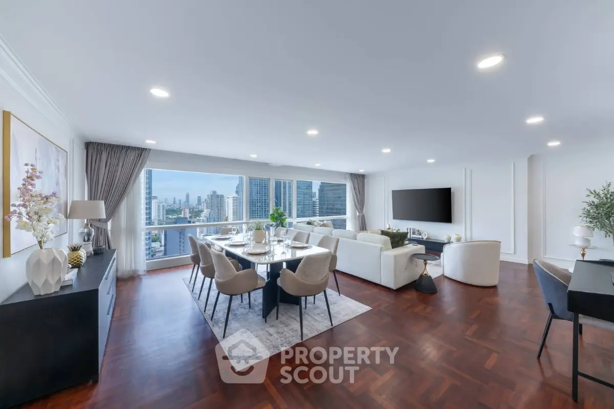 Spacious modern living room with city view, elegant decor, and ample natural light.