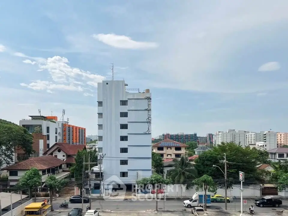 Urban skyline view with residential buildings and clear blue sky