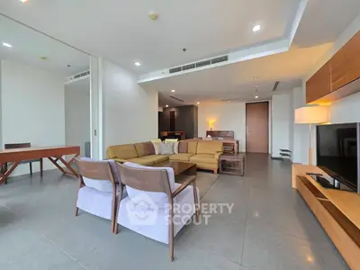 Spacious modern living room with elegant furniture and open layout
