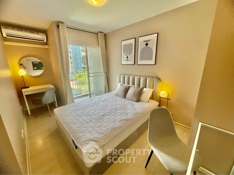 Cozy modern bedroom with balcony view and stylish decor