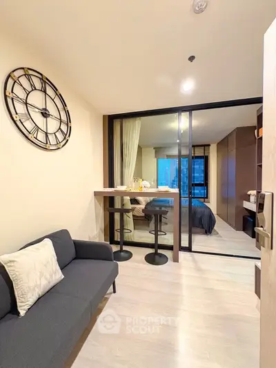 Modern studio apartment with stylish decor and city view