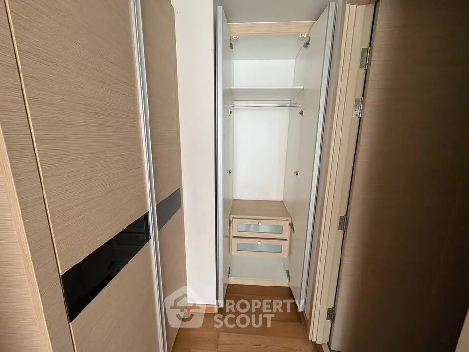 Spacious modern closet with wooden finish and ample storage space