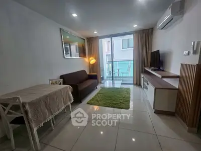 Modern living room with balcony access and stylish decor