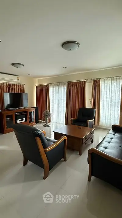 Spacious living room with elegant furniture and natural light