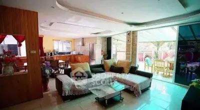 Spacious living room with open layout and abundant natural light