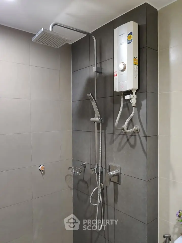 Modern bathroom with sleek shower and water heater installation