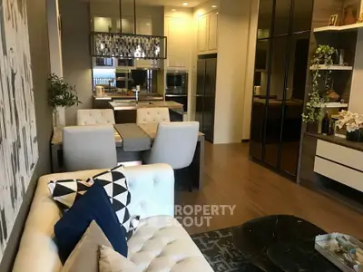 Luxurious modern living room with elegant decor and open kitchen layout