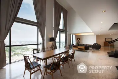 Luxurious high-rise apartment with panoramic city views and elegant modern interior design.