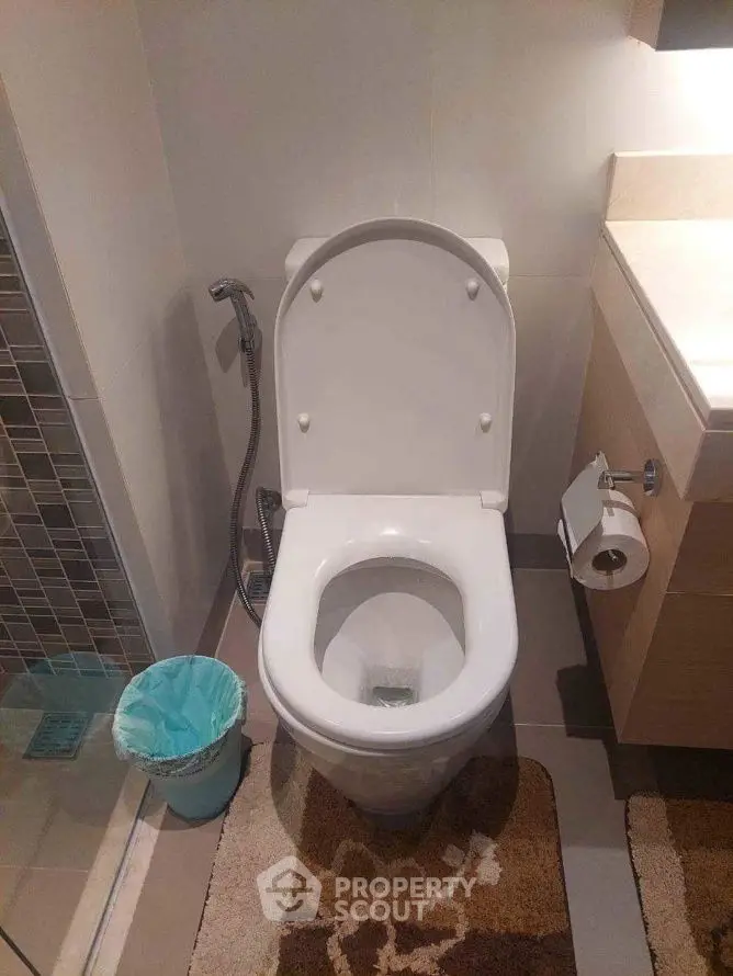 Modern bathroom with sleek toilet and stylish decor