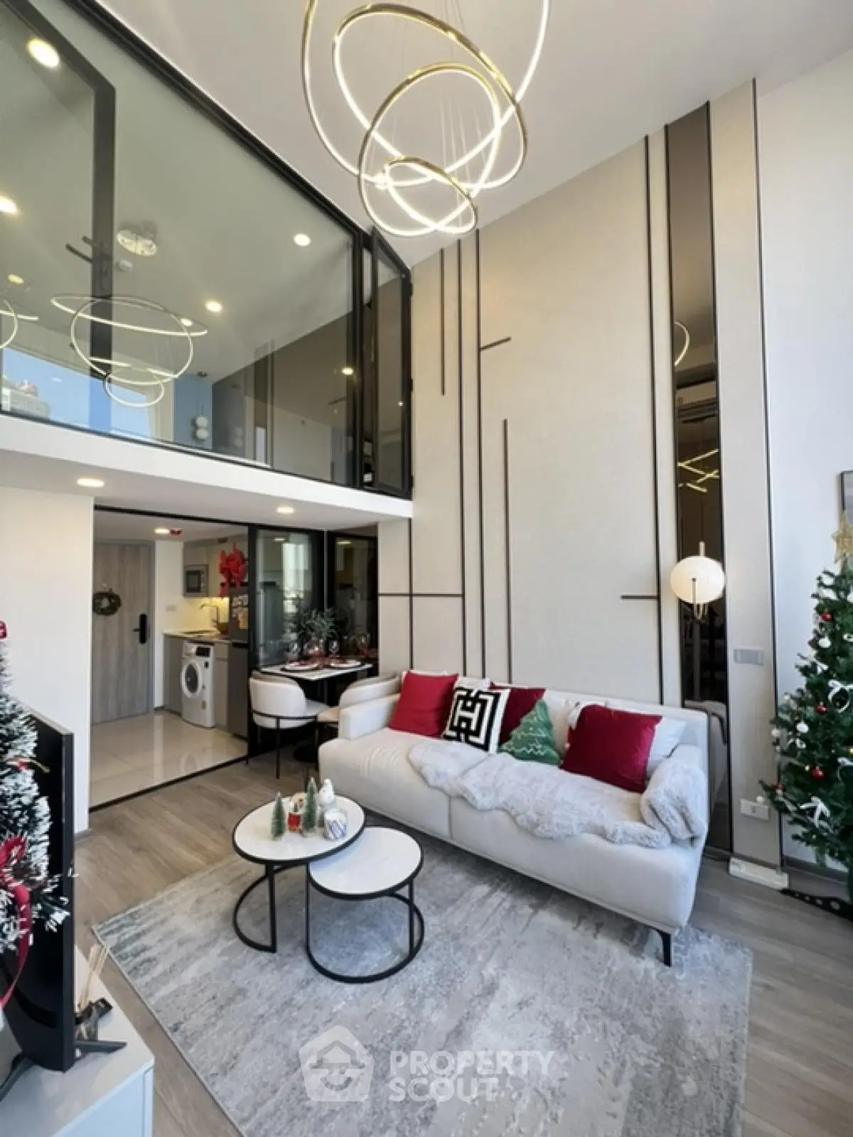 Modern living room with high ceiling and stylish decor in luxury apartment