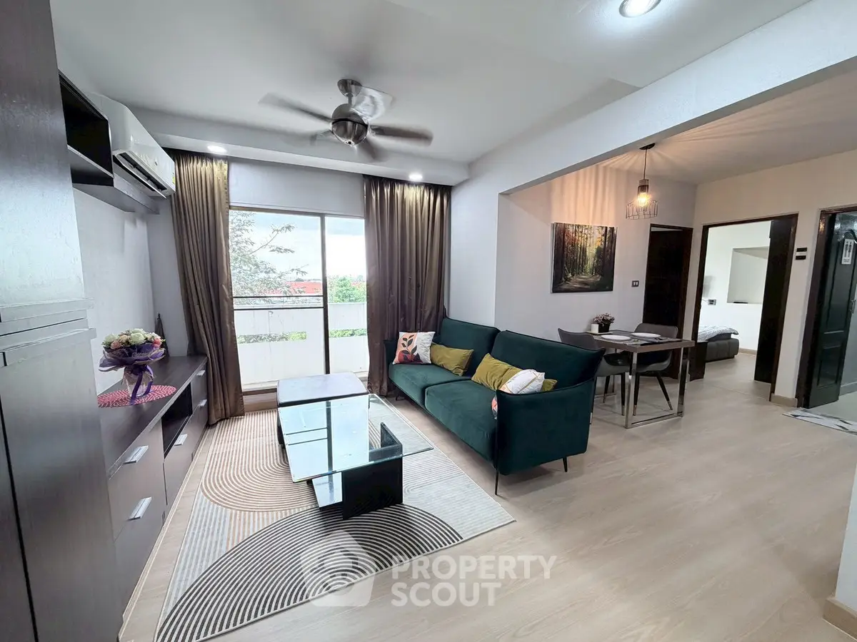 Modern living room with stylish decor and large window view