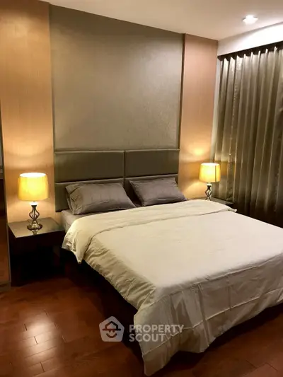 Luxurious bedroom with elegant lighting and modern decor, perfect for relaxation and comfort.
