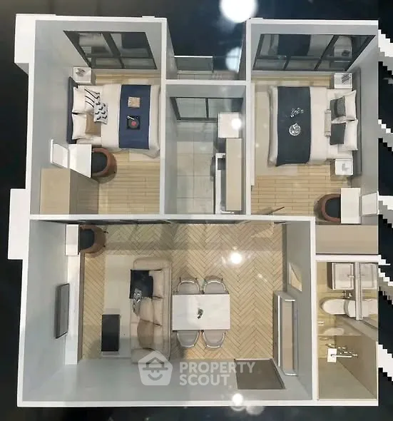 Modern apartment floor plan with two bedrooms, open living area, and stylish furnishings.
