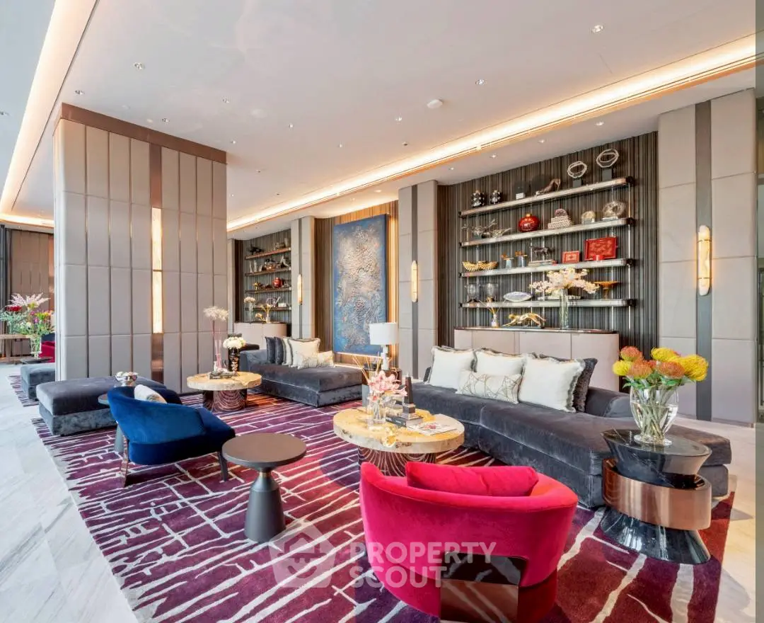 Luxurious modern living room with elegant decor and vibrant furniture in a high-end property.