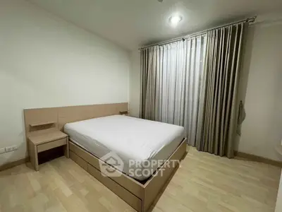 Spacious bedroom with modern design and natural light