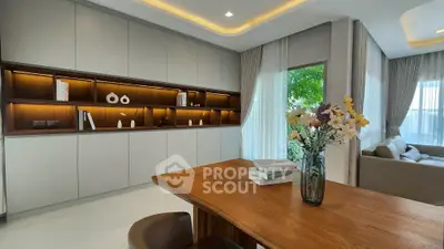 Modern living room with elegant built-in shelves and natural light