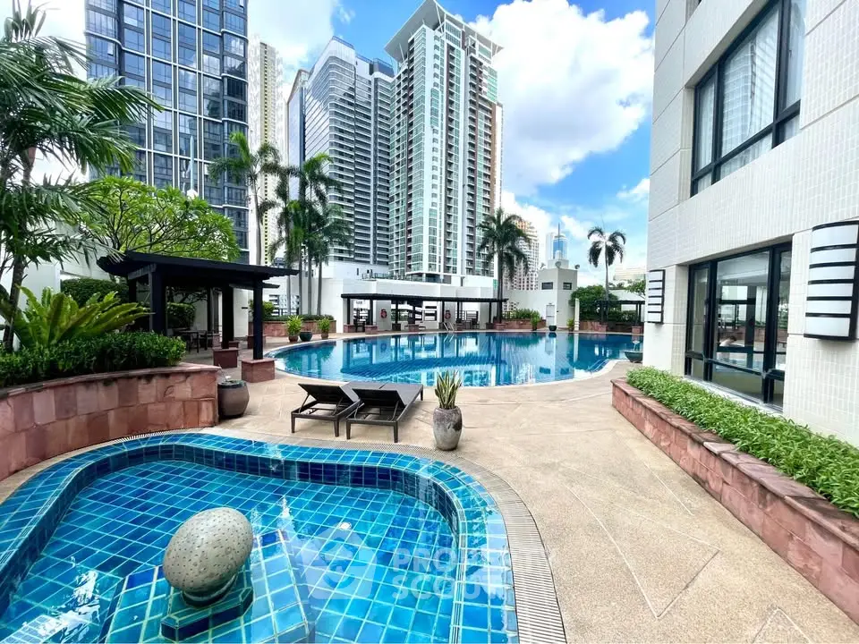 Luxurious urban pool area with modern high-rise buildings and lush greenery, perfect for relaxation and leisure.