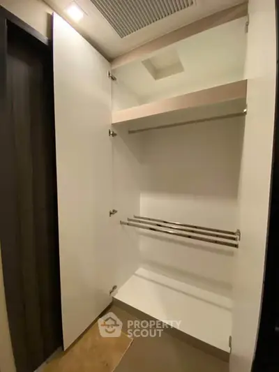 Spacious modern closet with sleek design and ample storage space