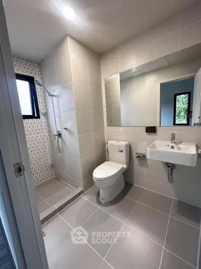 Modern bathroom with sleek design and spacious shower area
