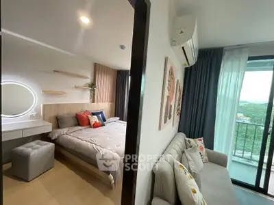 Modern bedroom with balcony view, stylish decor, and cozy seating area in a contemporary apartment.