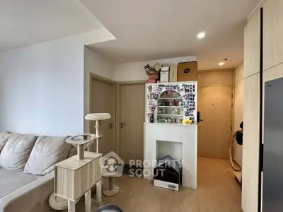 Cozy living room with modern decor and pet-friendly features, ideal for comfortable urban living.