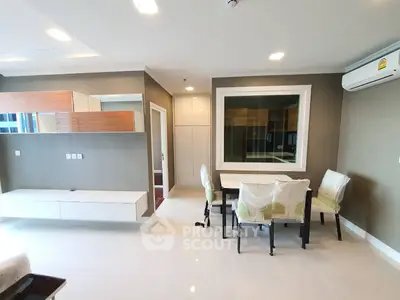 Modern living room with sleek furniture and air conditioning