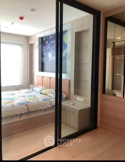 Modern bedroom with glass partition and stylish decor
