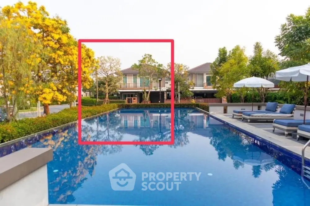 Luxurious residential pool with serene surroundings and modern architecture.