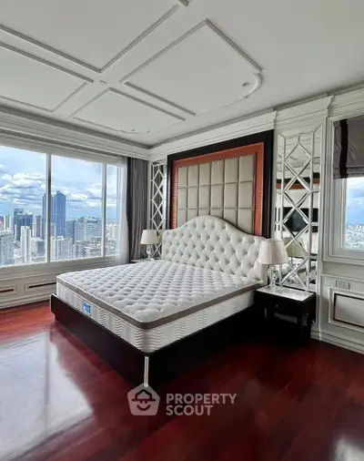 Luxurious bedroom with stunning city view and elegant decor