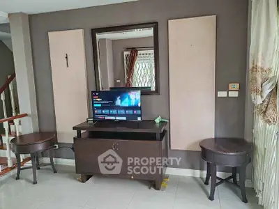 Cozy living room with modern TV setup and elegant decor