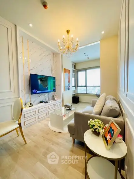 Luxurious living room with elegant chandelier and modern decor