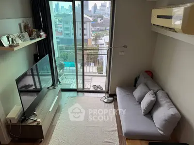 Modern living room with balcony view in urban apartment