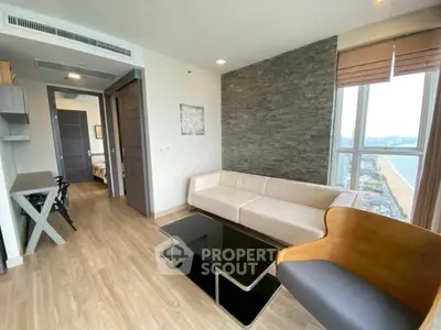 Modern living room with ocean view and stylish furniture