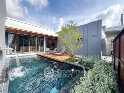 Luxurious modern villa with private pool and sun deck, perfect for relaxation and entertainment.