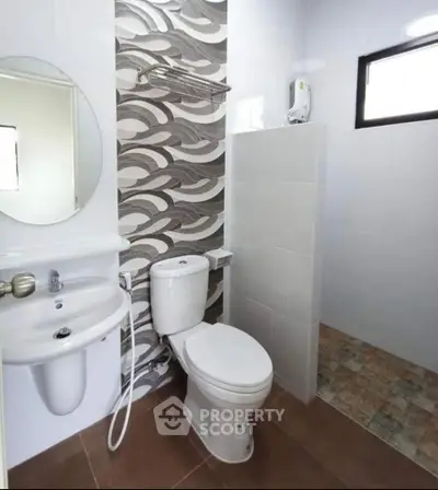 Modern bathroom with stylish tile design and sleek fixtures