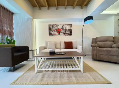 Stylish living room with modern furniture and cozy ambiance.