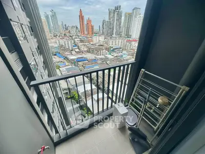 High-rise balcony with stunning cityscape view, perfect for urban living enthusiasts.