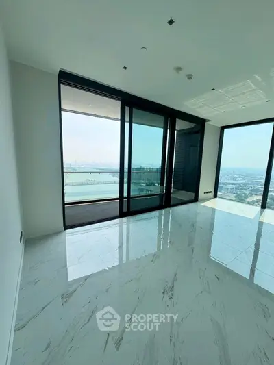 Luxurious high-rise apartment with stunning panoramic city and water views