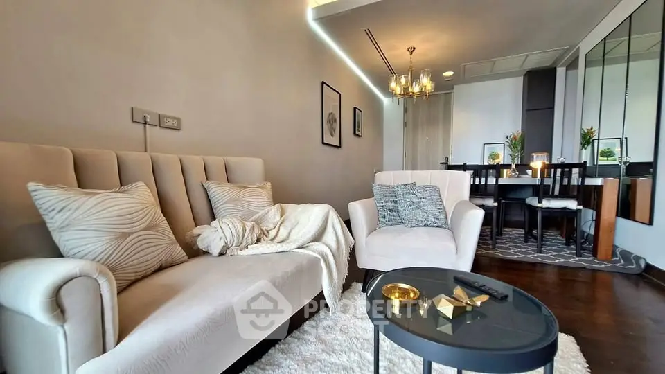 Luxurious modern living room with elegant decor and cozy seating area.