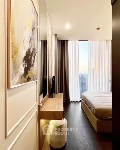 Luxurious bedroom with stunning city view and elegant decor
