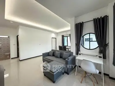 Modern living room with sleek furniture and ambient lighting