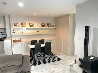 Modern living room with stylish dining area and sleek marble flooring