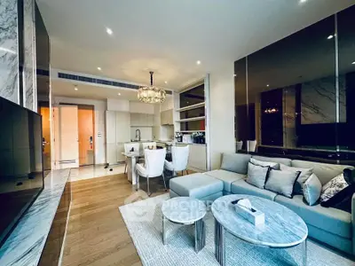 Luxurious modern living room with elegant decor and open kitchen layout