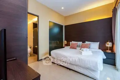 Modern bedroom with ensuite bathroom and stylish decor