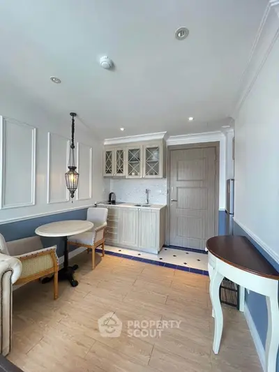 Charming kitchen with elegant dining area and classic decor