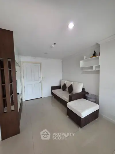 Modern living room with sleek furniture and minimalist decor