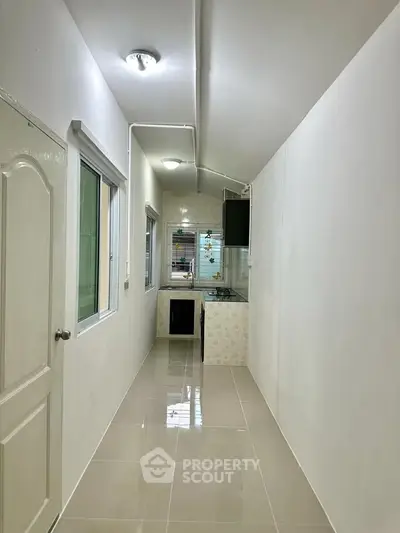 Compact kitchen with sleek design and modern appliances