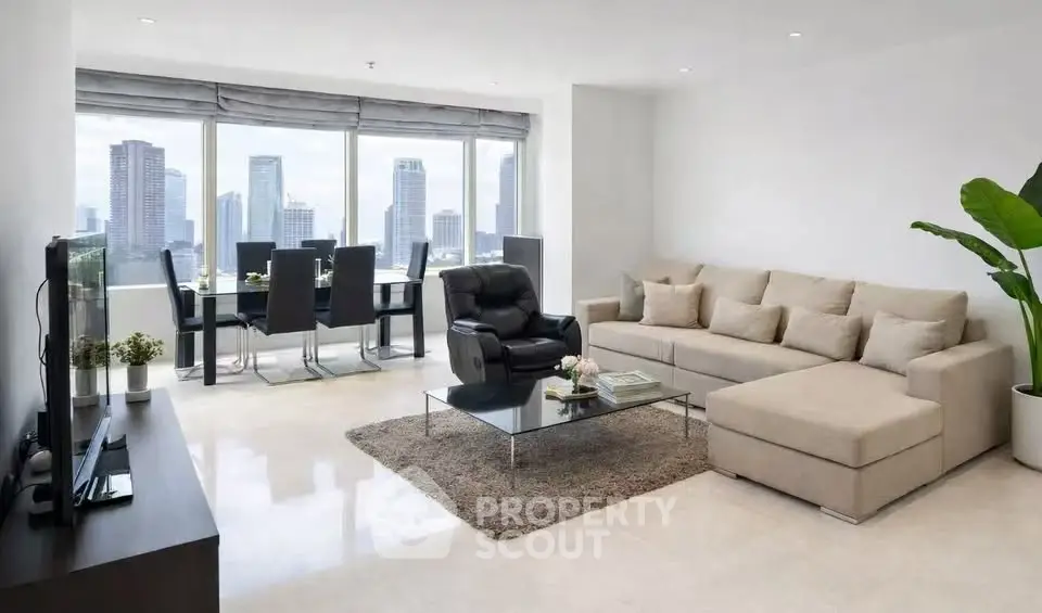 Spacious modern living room with city view and elegant dining area