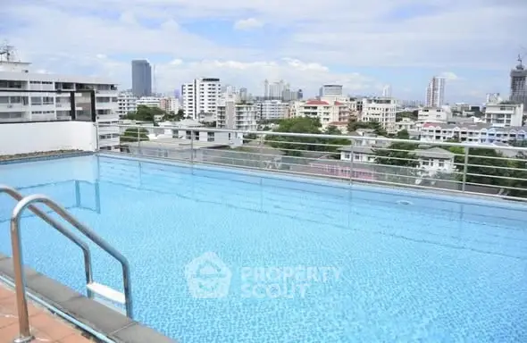 Stunning rooftop pool with panoramic city views, perfect for relaxation and leisure in urban living.